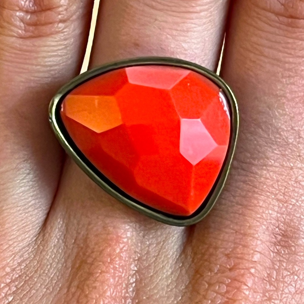 Brass and coral ring fits as a size 7